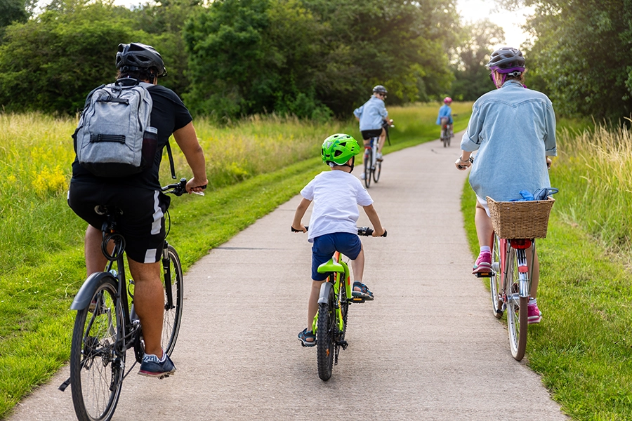 Family cycling outdoors